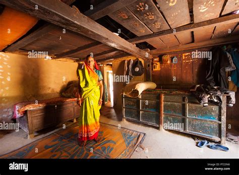 Indian Woman In Traditional Sari In His Kumaoni House At Kundal Village