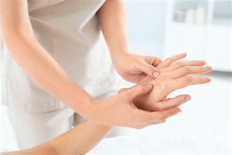 Woman Receiving Hand Massage In Wellness Center Stock Image Image Of Masseuse Massage 129847207