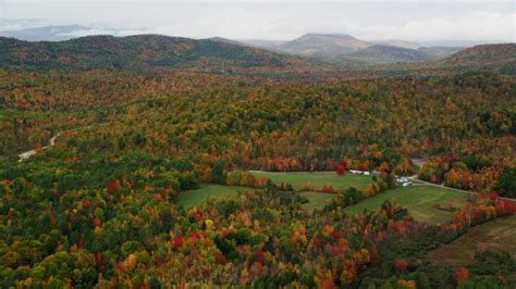 6k Aerial Video Orbiting Colorful Foliage Small Town Autumn