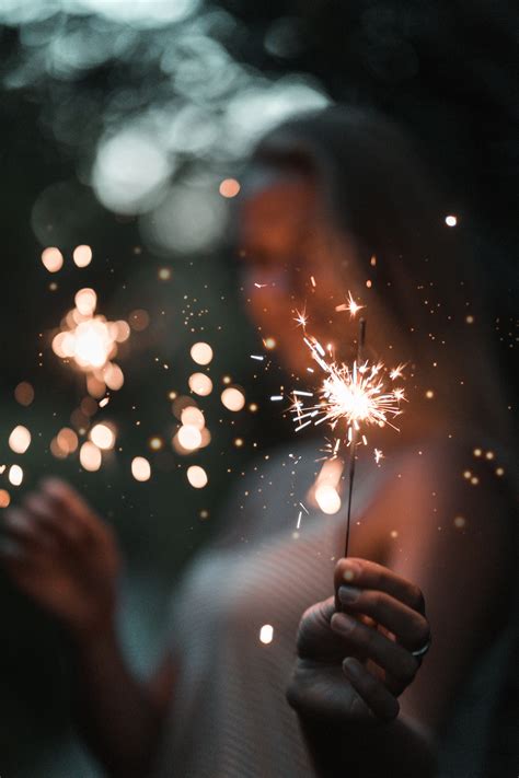 Hd Wallpaper Woman Holding Fire Cracker In Selective Focus Photography