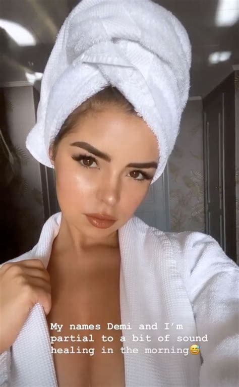 Demi Rose Sees Cleavage Erupt From Frontless Robe In Jaw Dropping
