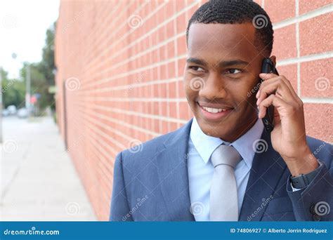 Handsome African American Modern Businessman Walking In Town And