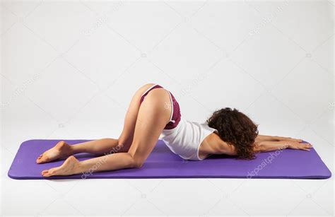 Yoga is a practice of breathing and holding different that's why doing yoga during your period is sometimes considered controversial, and many believe another study found that women who added yoga to their normal routine two times per week for. Sexy woman doing yoga exercises — Stock Photo © RVAS #90484002