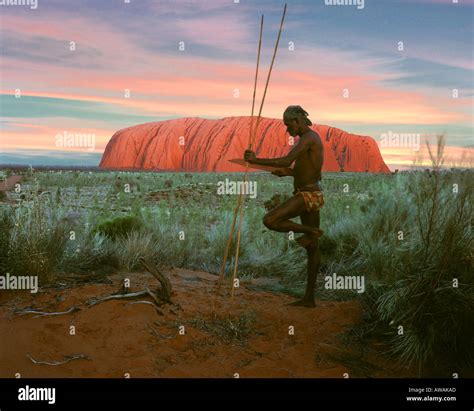Au Uluru Kata Tjuta National Park Aborigine At Uluru Formerly Known As Ayers Rock Stock