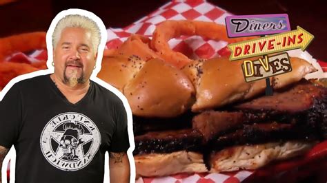 guy fieri eats texas brisket diners drive ins and dives food network bbq teacher video
