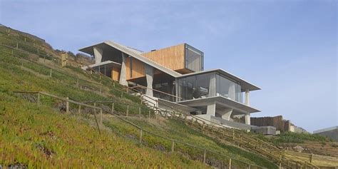 The Ghat House Sits On A Steep Slope Overlooking The Picturesque Pacific Ocean Sloping Lot