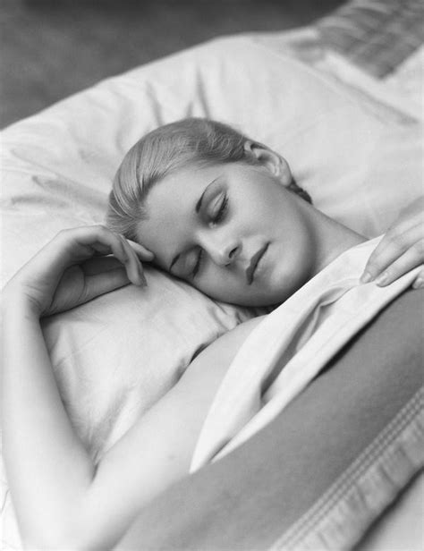 Sleeping Blond Woman Eyes Closed Head Resting On Pillow In Bed Posters And Prints By Corbis