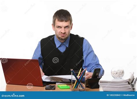 Disgruntled Office Worker Sits In His Workplace Stock Photo Image Of