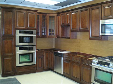 These are not stock photos, but kitchens completed by our own craftspeople. Walnut Kitchen Cabinets - Modernize