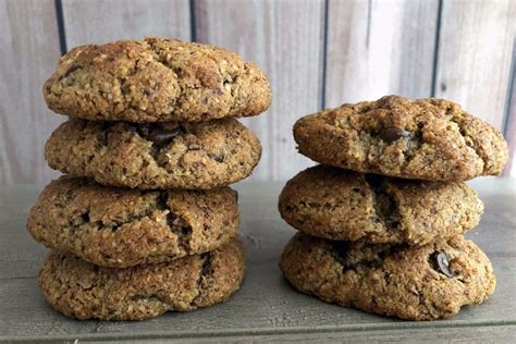 Three Cookies Stacked On Top Of Each Other With Chocolate Chips In The
