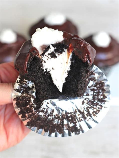 These cream filled cupcake are the perfect treat for a lovely morning or a sweet evening beside a glass of your favored beverage. Dark Chocolate Cream Filled Cupcakes | The BakerMama