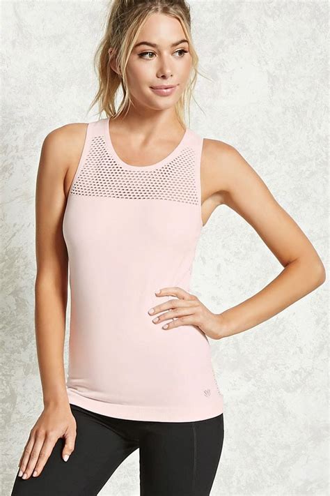 An Athletic Stretch Knit Tank Top Featuring A Front Semi Sheer Mesh