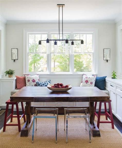 Adding a bench to a dining room table gives you more sitting space without making the room seem cluttered with more large, clumsy chairs. Pretty breakfast nook is filled with a built-in bench ...