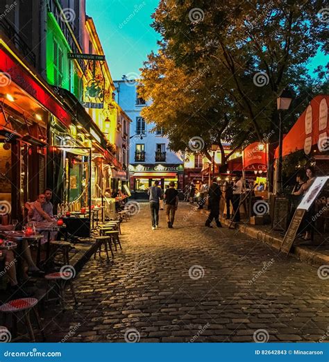 Nighttime On A Busy Montmartre Street On The Place Du Tertre Paris