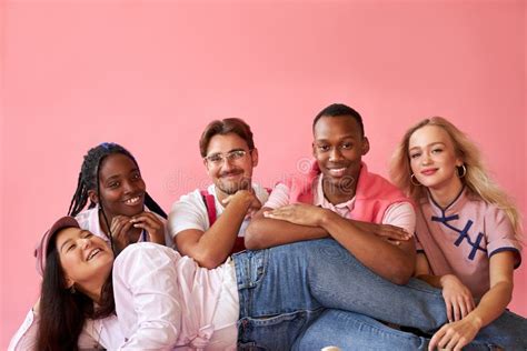 excited interracial group of youth have fun smile laugh stock image image of pink