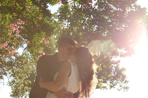 720x1280 Resolution Couple Kissing Under The Tree Hd Wallpaper