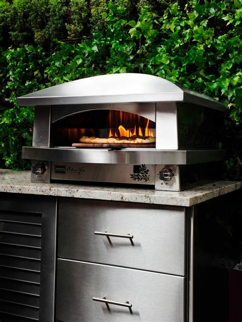 A compact pizza oven, it's perfect for outdoor kitchens and for fitting in projects where space is limited. Outdoor Kitchen Appliances | HGTV