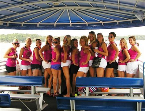 Bachelorette Party Wearing Pink And Having Fun On The Water At The Lake Of The Ozark