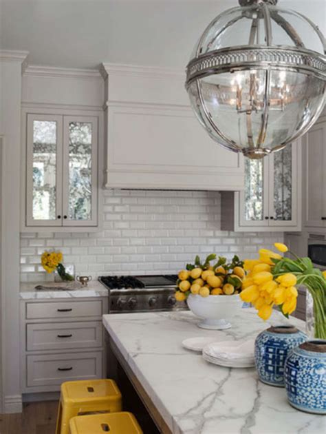 You may be considering decorating above kitchen cabinets if you don't have cabinets or cupboards that reach to the ceiling in your home. Mind the Gap: Fresh Ideas For Decorating the Kitchen ...