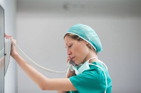 Premium Photo Female Surgeon Calling