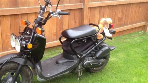 There's plenty of storage space, it's economical and fuel efficient, and it looks the part too. Honda Ruckus Scooter Under Seat Storage - YouTube