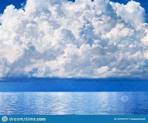White Cumulus Clouds Over Sea Close Up Blue Sky Background Landscape