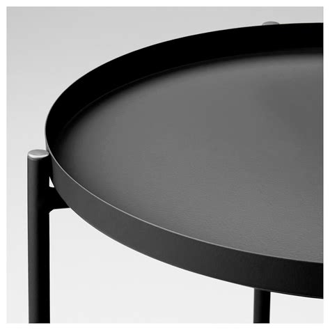 Favorite this post may 29 IKEA - GLADOM Tray table black in 2020 | Round black coffee table, Ikea tray table, Black coffee ...
