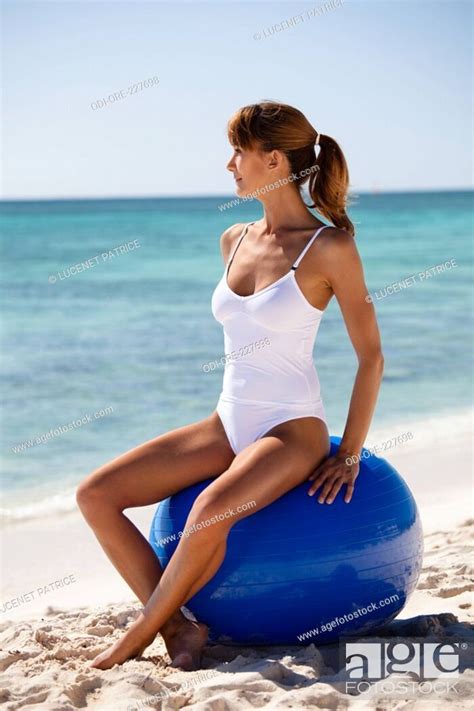 Woman Beach Ball Stock Photo Picture And Rights Managed Image Pic