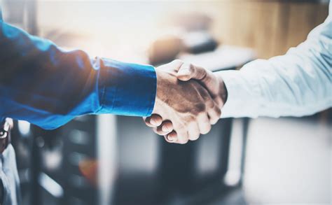 Close Up View Of Business Partnership Handshake Concept Photo Two Businessman Handshaking