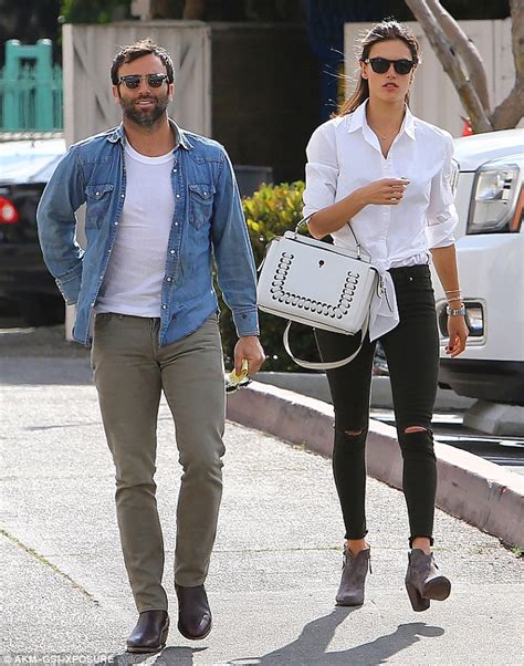 Alessandra Ambrosio Shows Off Her Long Legs In Denim With Fiance Jamie