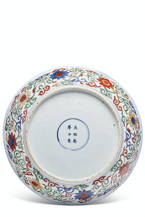 The name of the dish comes from the use of three animals. A RARE LARGE WUCAI 'DRAGON AND PHOENIX' DISH