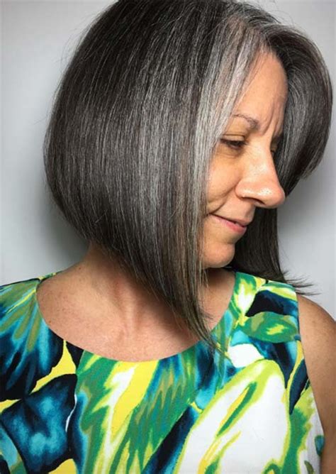 Dark and young short haircut for women over 50. Fresh Hairstyles for 50+ | Naviina Salon & Day Spa