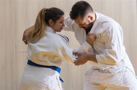 Woman And Man Judo Fighters In Sport Hall Stock Photo Image Of Duel