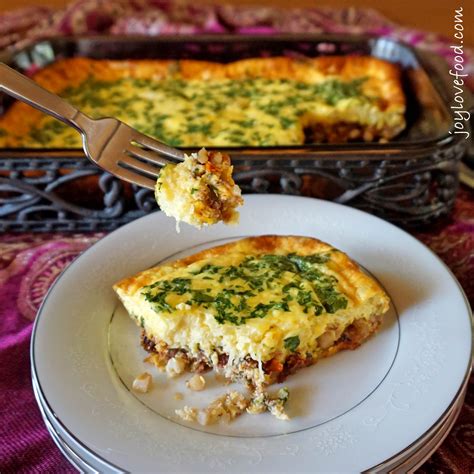 This post may contain affiliate links. Corned Beef Hash and Egg Casserole with Sun-Dried Tomatoes and Swiss Cheese - Joy Love Food