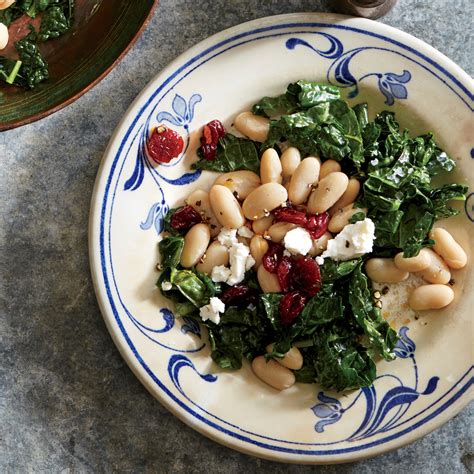 The starchy water combines with dry white wine to make a fantastic gravy, along with mounds of sausage and plenty of bacon! Cranberry-Goat Cheese White Bean and Kale Salad Recipe | MyRecipes