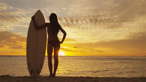 Surfer Girl Surfing Paddle For Surf On Surfboard Female