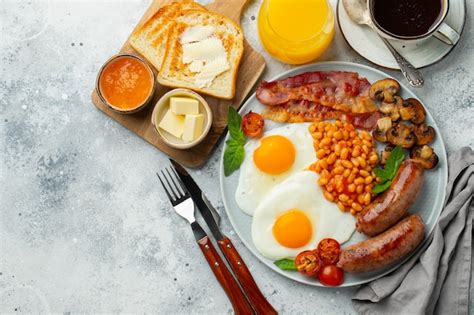 Premium Photo Full English Breakfast On A Plate With Fried Eggs