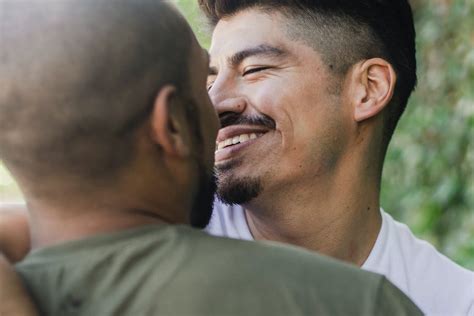 Two Men Embracing Each Other · Free Stock Photo