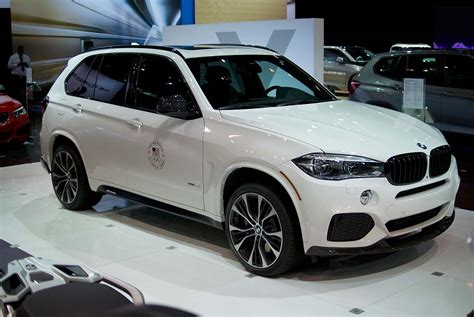 The bmw x5 m is the sport performance version that is ready to hit the track or leave your fellow travelers in the dust. 2014 BMW X5 with M Performance Part | Wallpapers9