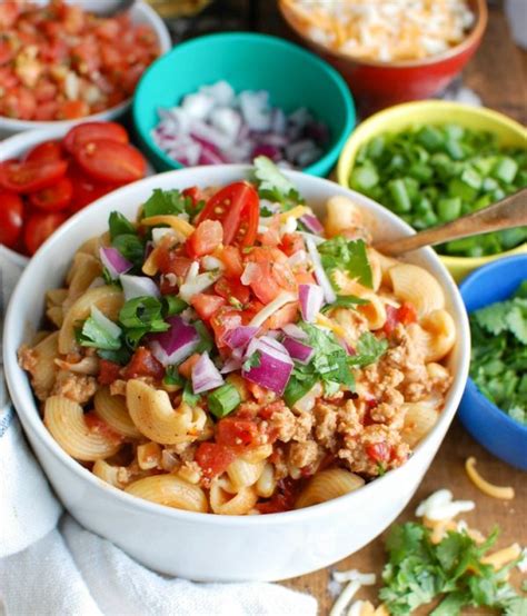 These 20 delicious & healthy ground turkey recipes are a great way to enjoy lean protein in a way that doesn't skip out on flavour! Instant Pot Turkey Taco Pasta Image 2 - A Cedar Spoon