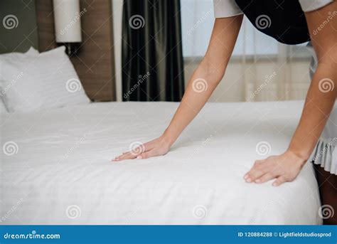 Cropped Shot Of Maid Making Bed Stock Photo Image Of Service Suite