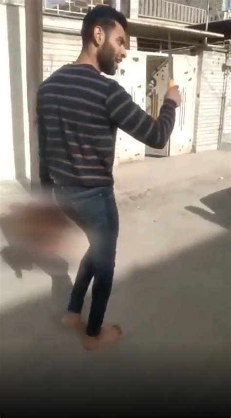 Em VÍdeo Grotesco Iraniano Sorridente Andando Pelas Ruas Com A Cabeça