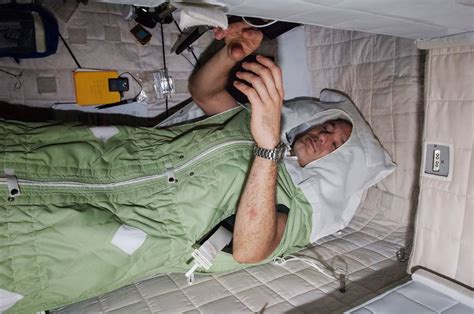 Astronaut Sleeping In Space