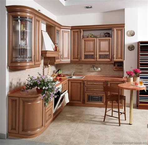 Unlike modern kitchens, traditional kitchens are all about the small details and individual one of the core fundamentals of a traditional kitchen is the raised panel cabinets which adds dimension and detail to the kitchen. Pictures of Kitchens - Traditional - Light Wood Kitchen ...