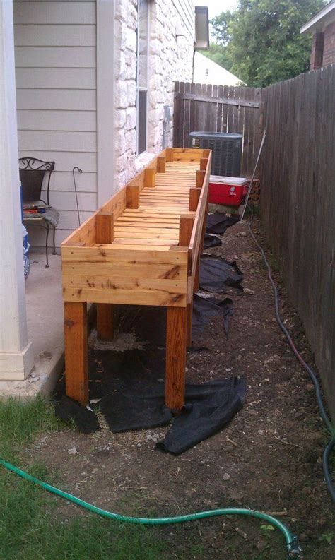 Raised beds also allow you to start fresh with enriched, uncontaminated soil shown: Waist High Raised Bed Garden Plans Waist High Raised Cedar Garden Bed Clean Code Picture | Dig ...