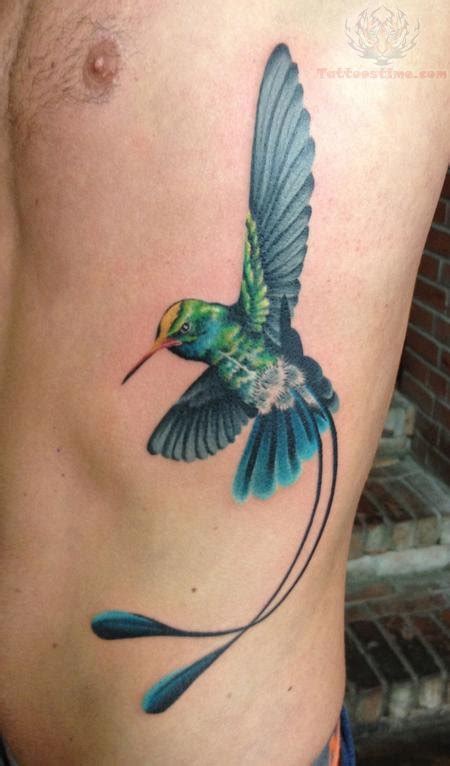 Colorful Flying Bird Tattoo On Man Side Rib