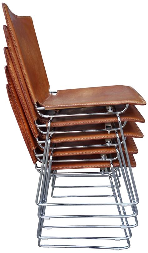 Perfect for conference or meetings and coming a selection of colours and types. 20 Midcentury Pelle Stacking Chairs by ICF at 1stdibs