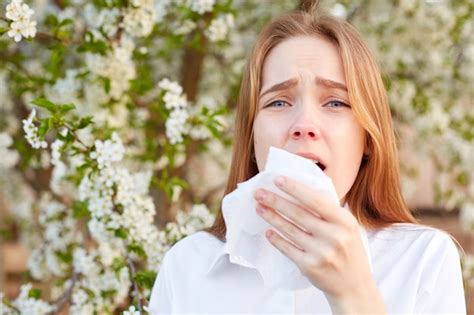 Premium Photo Allergy Symptoms Displeased Young Woman Uses Tissue