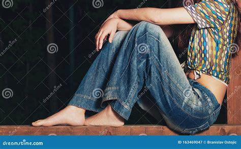 Young Barefoot Woman In Boho Style Clothes Jeans And Shirt Outdoor Shot