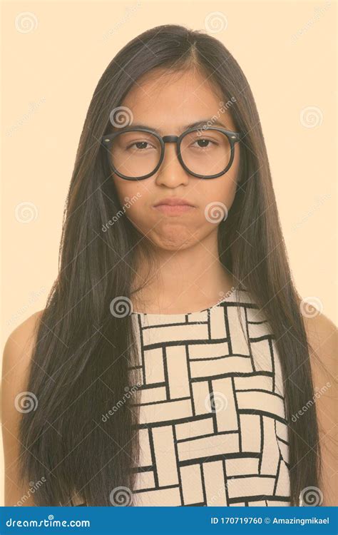 Face Of Young Asian Teenage Nerd Girl Looking Upset Stock Photo Image